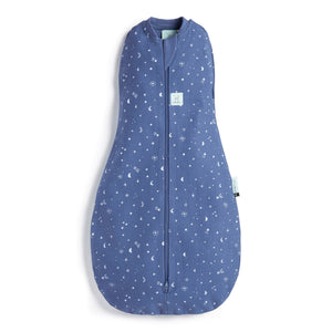 Front of the dark blue coloured cocoon style sleeping bag with small night sky theme prints on it